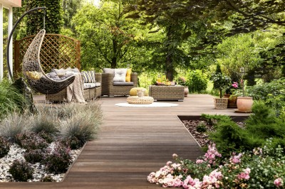 Beautiful backyard deck and furniture area.