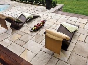 Outdoor patio stones installed with modern furniture.