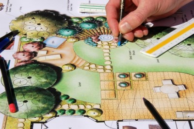 Person planning their next landscape project. Person planning their next landscape project.