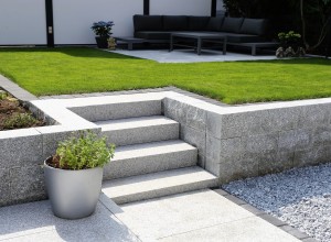 Perfectly landscaped backyard lawn and steps