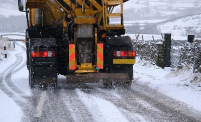 Salt truck working in the winter. Salt truck working in the winter.