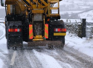 Salt truck working in the winter.