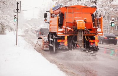 Road salt being applied to the streets in the winter. Road salt being applied to the streets in the winter.
