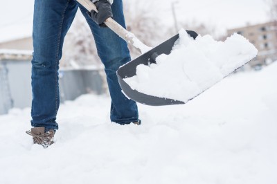 Man shovelling snow.